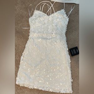 Brand new never worn mini sequins dress. Bought for bachelorette but never wore.